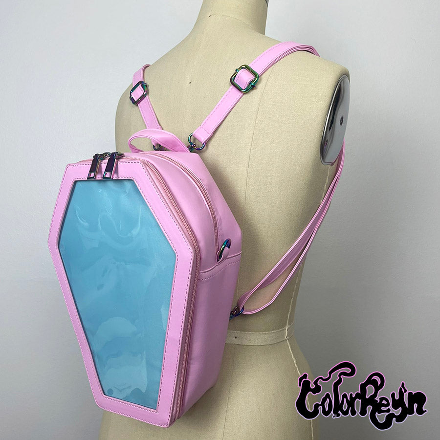 spooky pink pastel coffin anime ita bag, worn as a backpack side view
