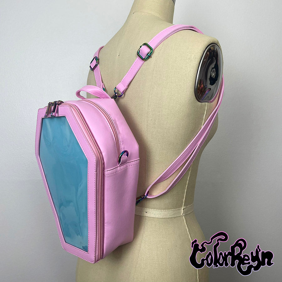 spooky pink pastel coffin anime ita bag, worn as a backpack side view