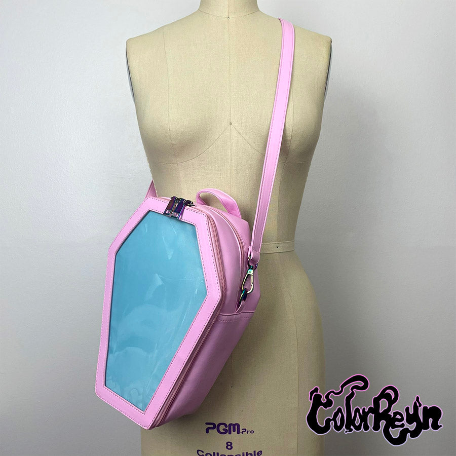 spooky pink pastel coffin anime ita bag, worn as a crossbody front view