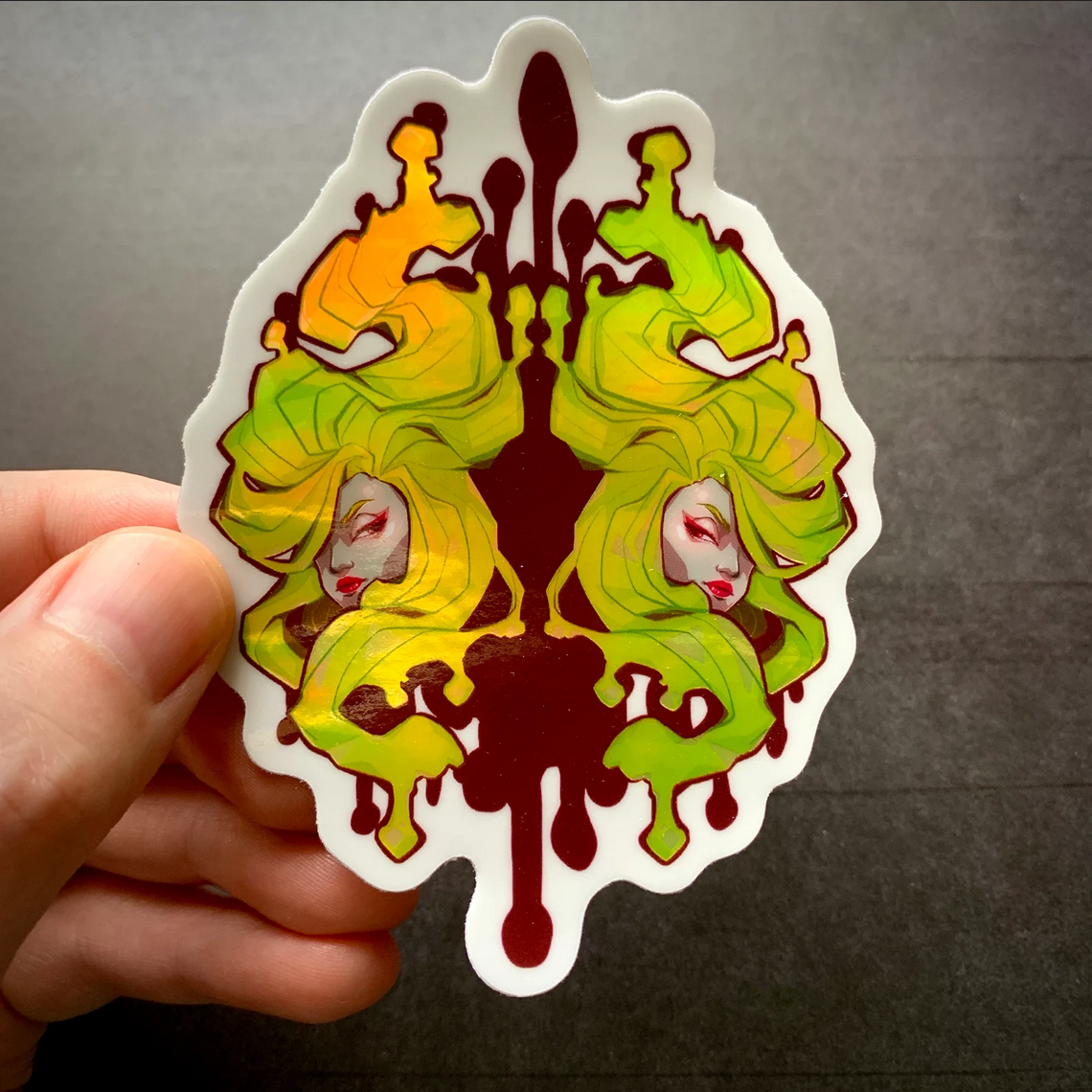 Floating Heads Holographic Sticker